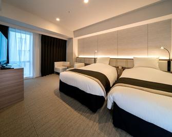 Daiwa Roynet Hotel Okinawa Kenchomae - Naha - Bedroom