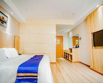 Super 8 by Wyndham Hetian Tuan Jie Square - Ciudad de Jotán - Habitación