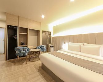 Denbasta Premium Hotel Bumil - Μπουσάν - Κρεβατοκάμαρα