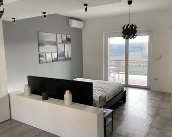 Luxueuse villa avec vue sur mer - تورينو دي سانجرو - غرفة نوم