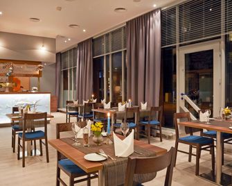 إتش4 هوتل هامبورج بيرجيدورف - هامبورغ - مطعم