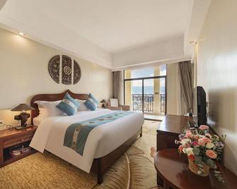 Jingland Exhibition Hotel - Xishuangbanna - Bedroom