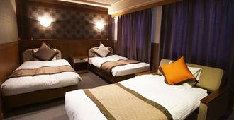 Hotel Areaone Kochi - Kochi - Yatak Odası
