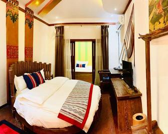 Bodhi Residency Inn - Diqing - Bedroom