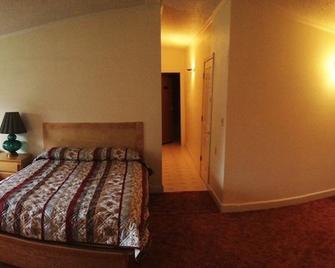 Comfort Green Motel - Thayer - Bedroom