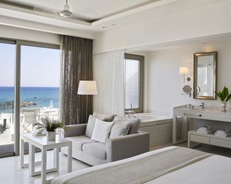 Knossos Beach Bungalows Suites Resort & Spa - Kokkini Hani - Wohnzimmer