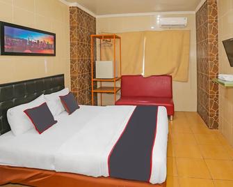 Hotel O Sion Holiday - South Tangerang City - Ložnice