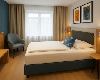Four Points Flex by Sheraton Hannover - Hannover - Bedroom