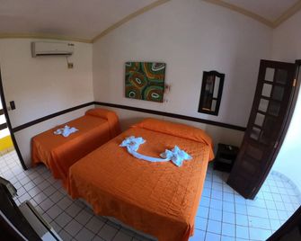 Retiro espiritualista pousada casa de madeira - ปอร์โต เดอ กาลินฮัส - ห้องนอน