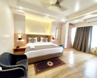 Goroomgo Grand Resort Puri - A Luxurious Collections Sea View Room - פורי - חדר שינה