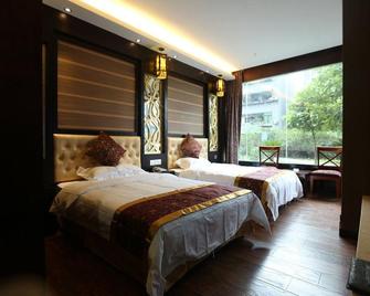 Yihao Huayuan Hotel - Chongqing - Bedroom
