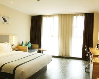 CC Inn (Zigong Wanda Plaza) - Zigong - Bedroom