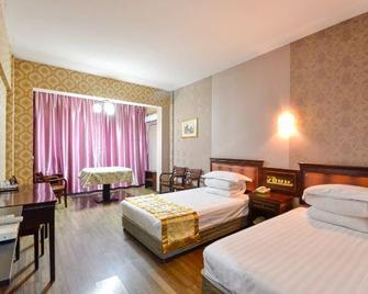 Taizhou Taishan Business Hotel - Taizhou - Schlafzimmer