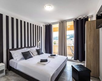 Apartments & Rooms Sunshine Home - Vela Luka - Yatak Odası