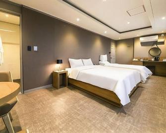Gangneung Olympia Hotel - Gangneung - Habitación