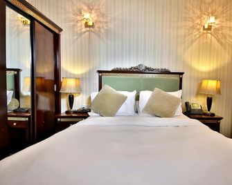 Midtown Furnished Apartments - Ajman - Bedroom