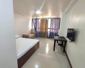 Green Ridge Apartelle - Malaybalay - Habitación