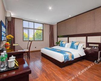 Kun Cheng Hotel - Kunming - Bedroom