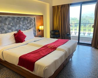 The Saroja Grand Villa Resorts - Mumbai - Quarto
