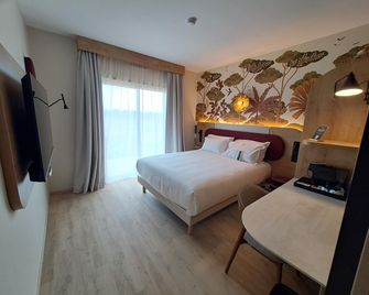 Kyriad Prestige Pierrelatte - Pierrelatte - Bedroom