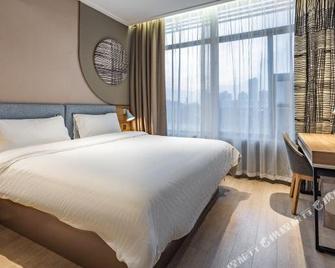 Rujia China Inn Zhilv Hotel (Anqing Yingjiang Temple Renmin Road Pedestrian Street) - Anqing - Habitación