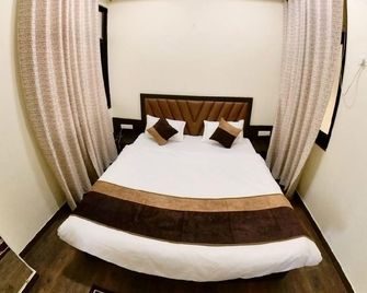 Hotel Govindam Elite - Kanpur - Schlafzimmer
