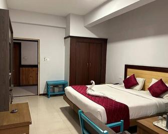 Hotel Preethi Palace - Ooty - Κρεβατοκάμαρα