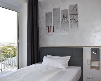 Hotel am Waldkasino - ארפורט - חדר שינה