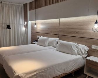 Imi Hotel & Spa - Ourense - Schlafzimmer