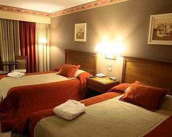 Howard Johnson by Wyndham Villa Maria Casino - Villa Maria - Slaapkamer