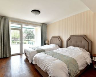 Qingdao Oceanside Hotel & Resort - Qingdao - Sovrum