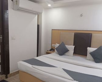 Hotel Future Inn - Noida - Schlafzimmer