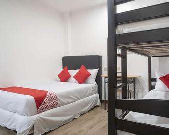 OYO 552 Vines Ape Nap Hostel - Tagum - Habitación