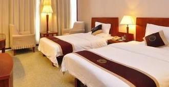 Kunming Plateau Pearl Hotel - Kunming - Yatak Odası
