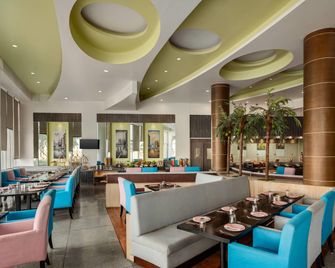 Maha Bodhi Hotel.Resort.Convention Centre - Bodh Gaya - Restaurante