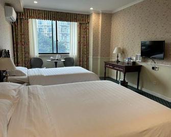 Oak Hotel Chongqing Yingxiang Branch - Chongqing - Habitación