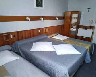 لو شاليه سانت لويس - لورد - غرفة نوم