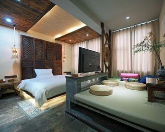 China Old Story Inn Lijiang Elite Garden - Lijiang - Bedroom