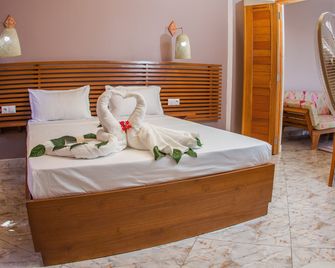 كامبريا أوتل - نوسي بي - غرفة نوم