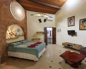 Pousada Canto No Bosque - לנקואה - חדר שינה