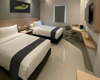 Kamari Hotel Ambon - Ambon - Slaapkamer