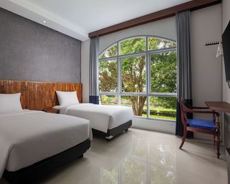 Casa de Lani Resort & Convention - Baturaden - Habitación