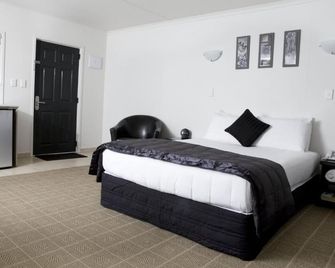 هيجيت موتور لودج - هاملتون - غرفة نوم