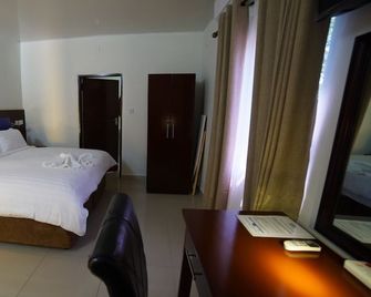 Maun Executive Inn - Maun - Schlafzimmer