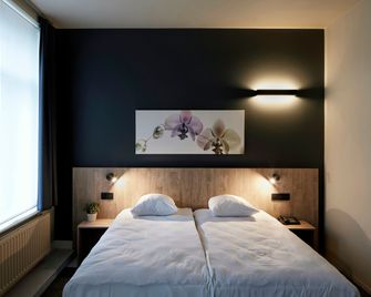 Alpha Hotel - Tienen - Schlafzimmer
