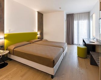 Hotel Italy - Bibione - חדר שינה
