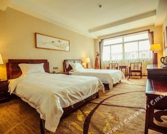 Wenjukejun Hotel (Bubugao Plaza Xiangtan Iron and Steel Co., Ltd. Branch) - Xiangtan - Bedroom