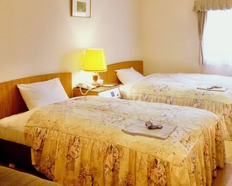 Okayama Universal Hotel Annex - Okayama - Slaapkamer