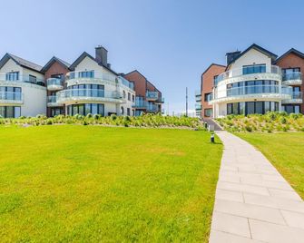 Katamarany Zatoka, Sun & Snow - Puck - Edificio