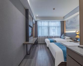New e Fashion Hostel - Ningbo - Bedroom